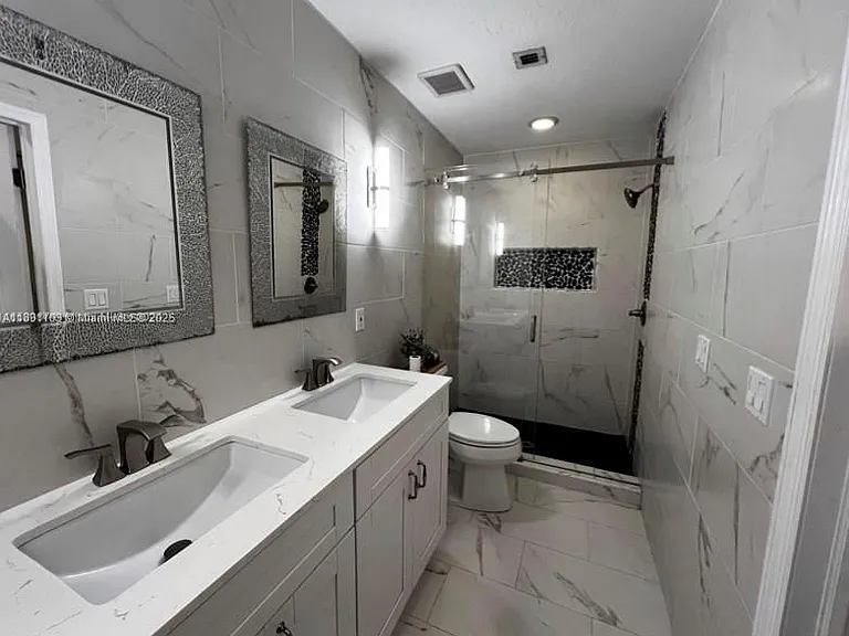 12591 NW 57th Pl #TOWNHOUSE — Photo 6