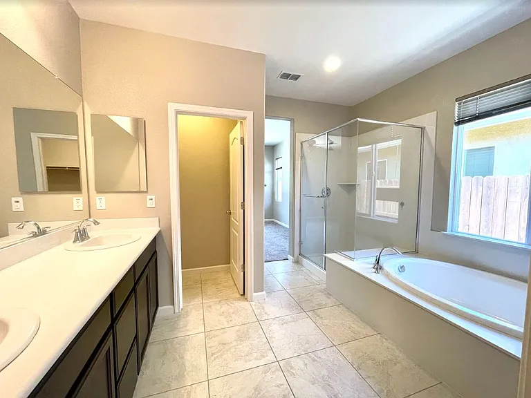 Main Bedroom Bathroom: Walk In Shower, Double Sinks, Soaking Tub