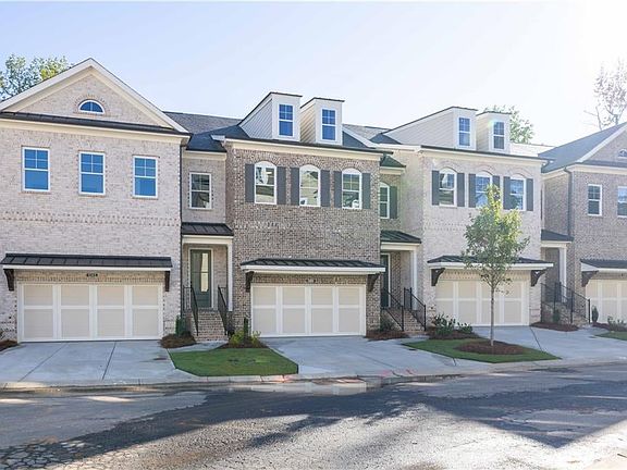 The Stockton on an unfinished basement - front entry garage. Photo not of actual home, but a previou