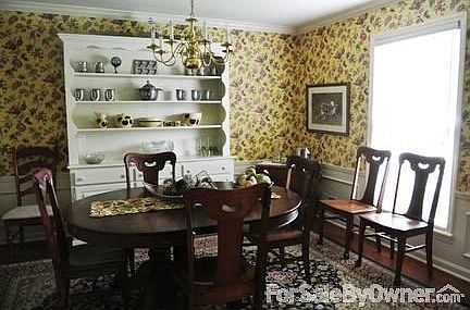 Dining Room
						:
						Spacious, top-grade laminate flooring, crown moulding, wainscoating.