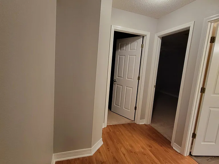 Hallway (left to right - Bedroom 4, Bedroom 3, Bathroom 2)
