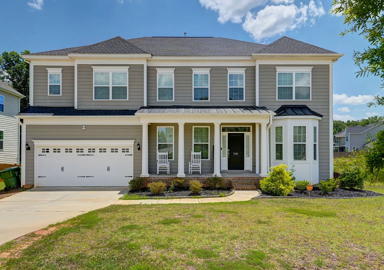 Welcome to 2286 Harvestwood Lane, a luxurious 5-bedroom, 4.5-bath home nestled in the serene comm... — Photo 1