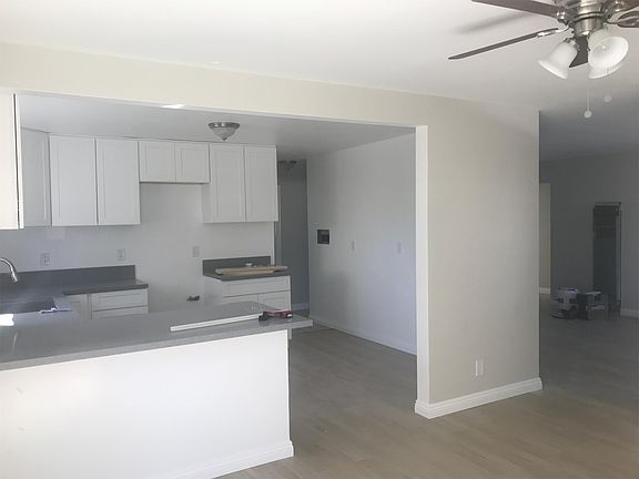 Kitchen view leading to living