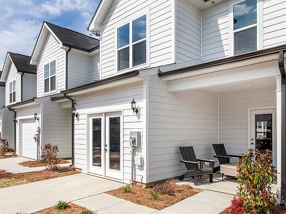 Graylyn Exterior 6 features siding, covered front porch and 1-car rear load garage