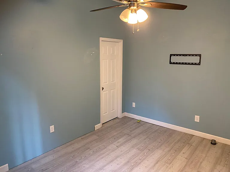 Fourth bedroom with walk-in closet and private bathroom
