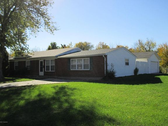 Side view with 2 1/2 car garage