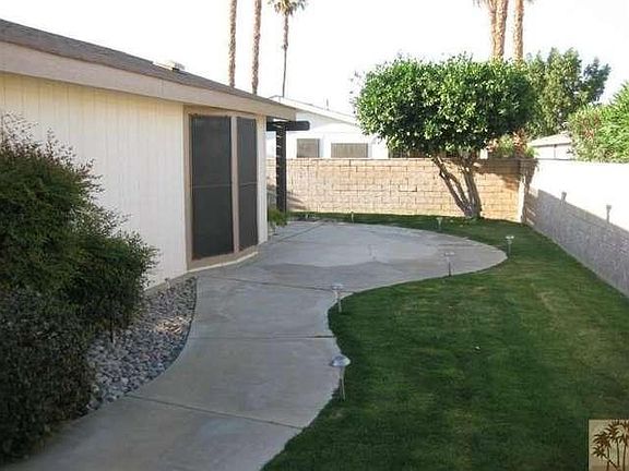 side yard (the garage is behind me)