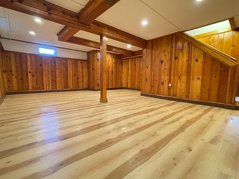 Bright and spacious finished basement with loads of dimmable, recessed LED lights