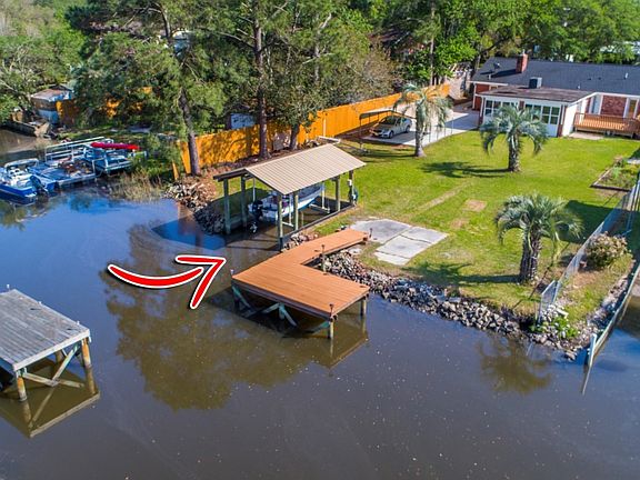 Up Close Aerial of Dock & Covered Boat Lift