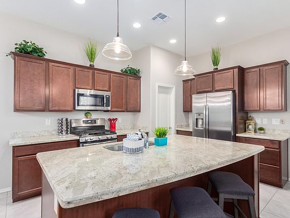 High 10' ceilings make home feel spacious.