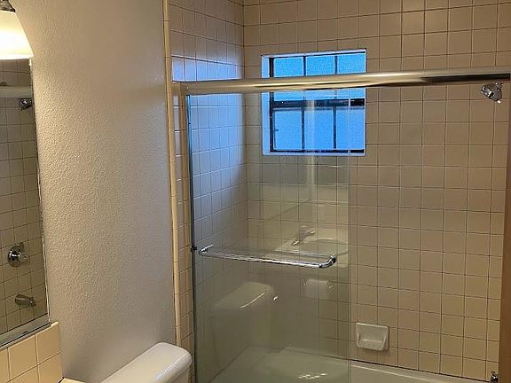 Full bathroom with Tub and shower, built in medicine cabinet