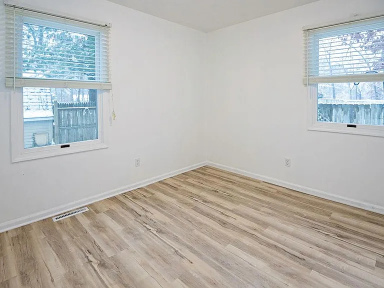 2nd bedroom. Lots of natural light. Also overlooks private backyard