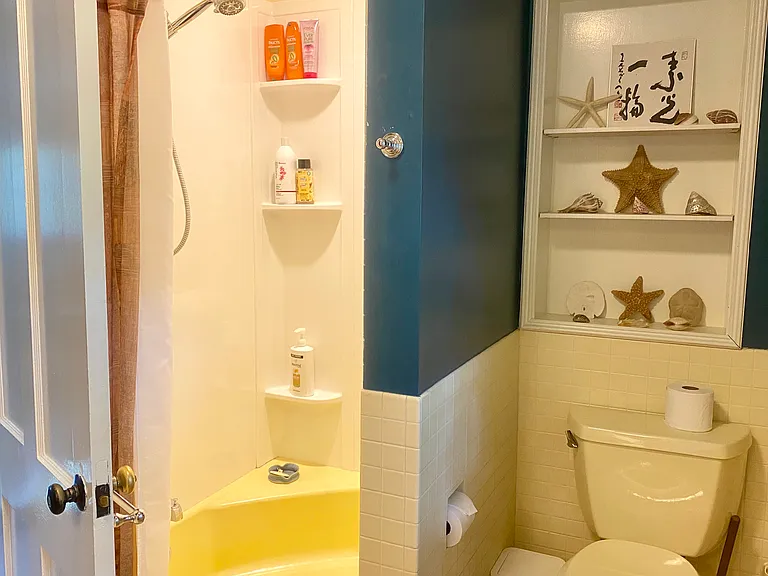 Bathroom has tub base - great for washing children or soaking in.