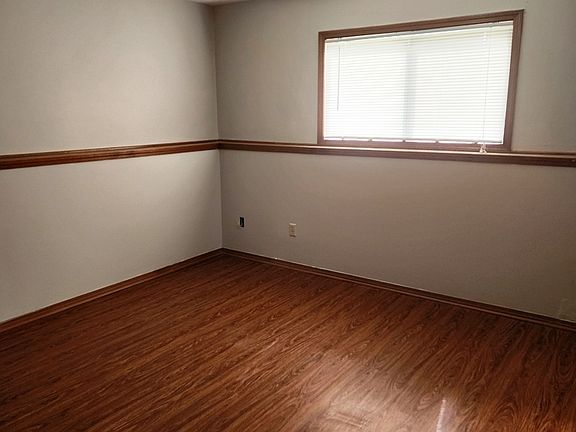 Master bedroom with separate entrance to bathroom.