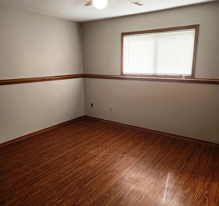 Master bedroom with separate entrance to bathroom.