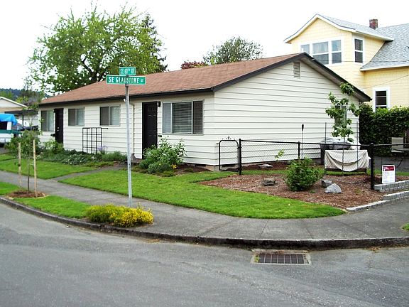 Front with fenced yard and patio area