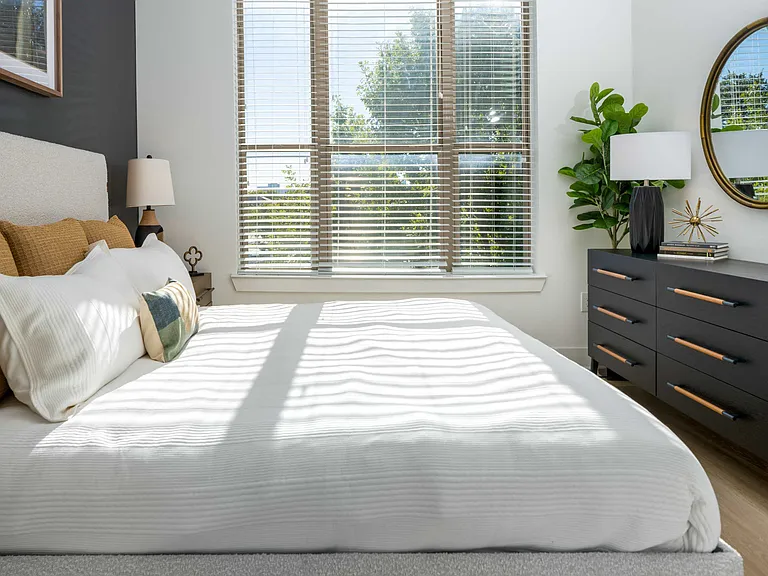 Bedrooms with large windows and ample natural sunlight