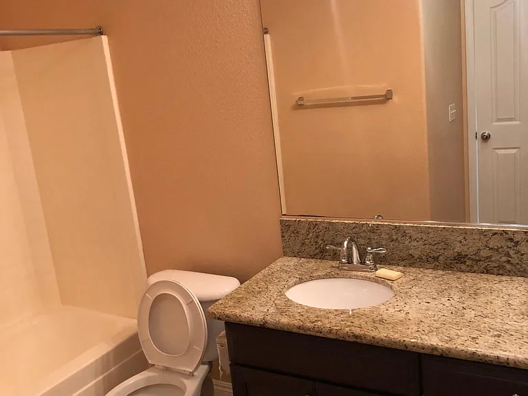 Downstairs bathroom #1 with granite counter top