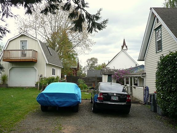 Back yard showing garage/studio and back of house taken May 2008