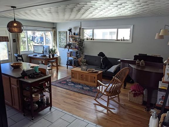 Main room (living area on one side and kitchen on the other)
