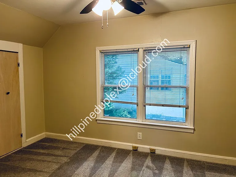 Second bedroom with large closet. Great bedroom or home office.