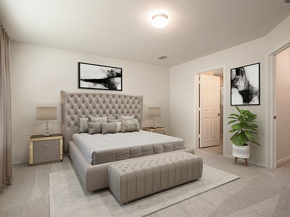 Owner s suite with large windows and private bath