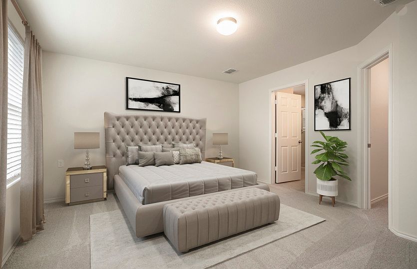 Owner s suite with large windows and private bath