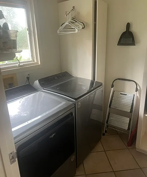 Whirlpool washer and dryer. Window to the back yard gives you lots of light.