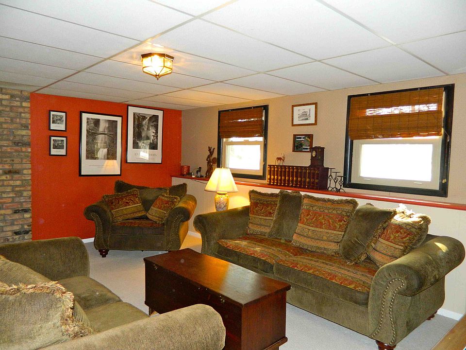 Large comfortable living room with a gas fireplace.