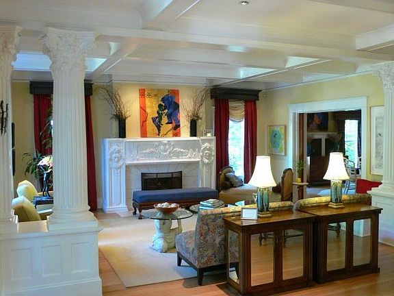 Coffered ceilings, original hardwood floors, limestone fireplace, and more..