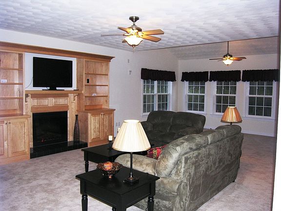 HUGE great room, built in entertainment center, massive windows 