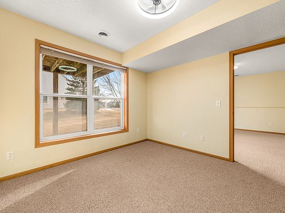 The Third BR in the lower level with ceiling light/fan. The lower level also has a Full Bath.
