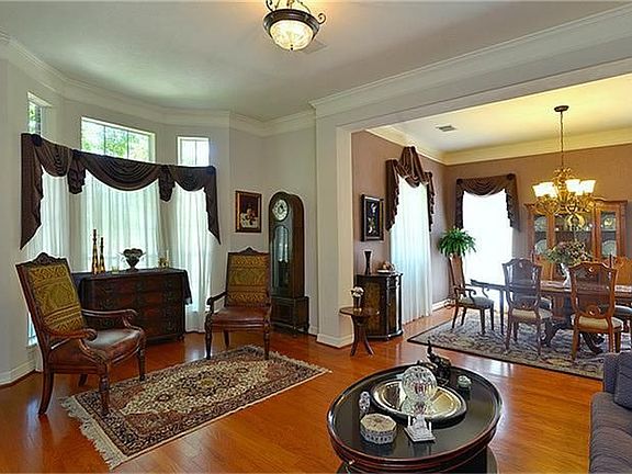 The gorgeous hardwood floors flow through much of the ground floor.