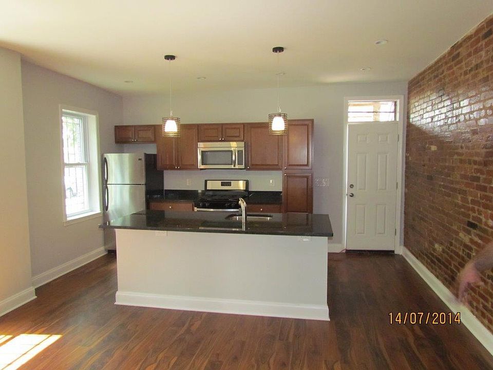 Main kitchen/living area. Gas stove, dishwasher, plenty of c