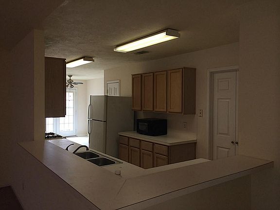 Kitchen is open to break fast, den and dining room