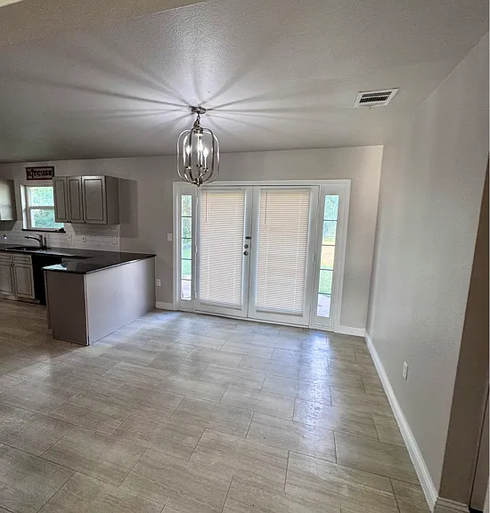 Photo from a previous listing. Tenant is currently occupying the Home.