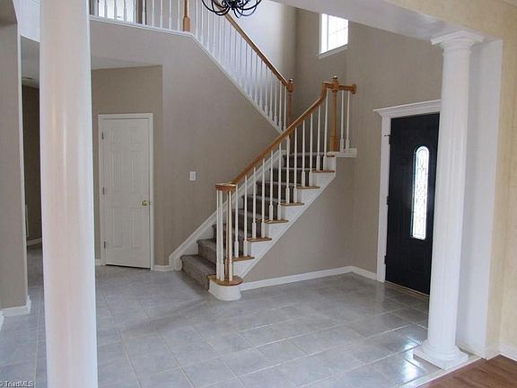 Two story foyer with open staircase