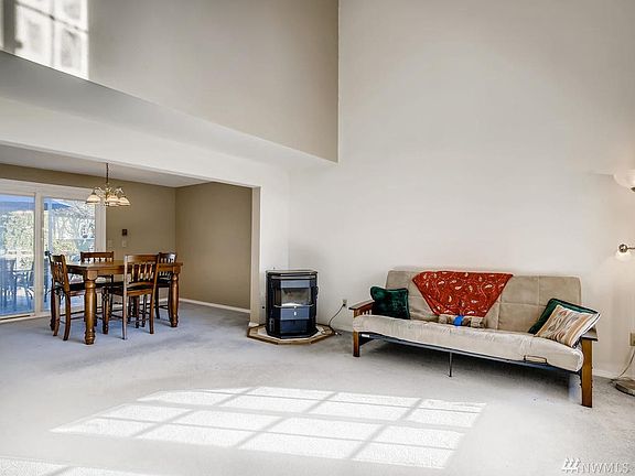 Large open space leads into the dining area and eventually to the large deck outside.