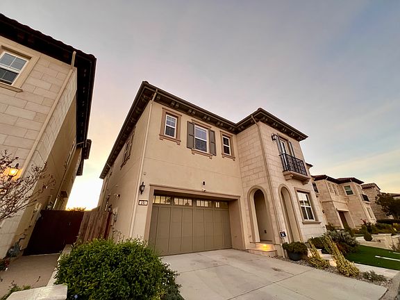 Front of Home + Garage and Driveway