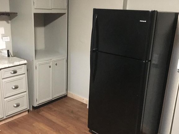 Nice fridge and flooring!