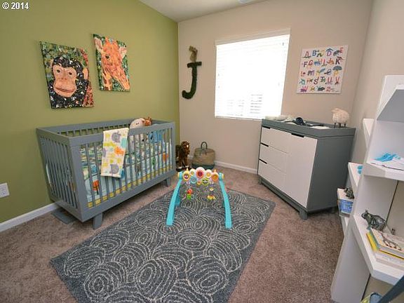 one of two smaller bedrooms