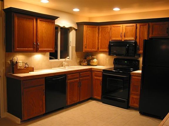 Kitchen includes dishwasher, self-cleaning oven, microwave,