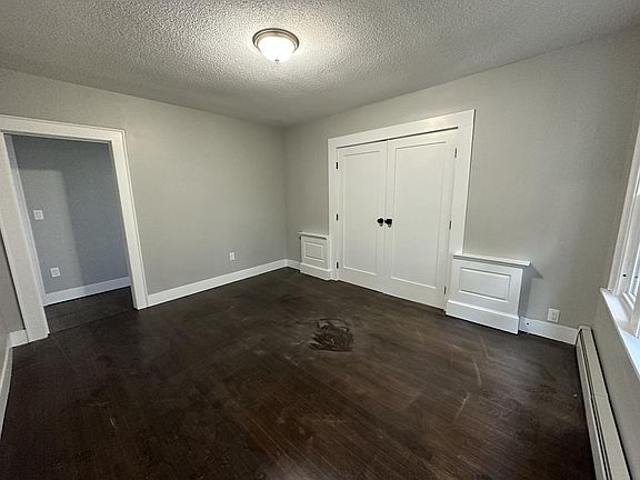 Living room, the closed doors lead to bedroom 1