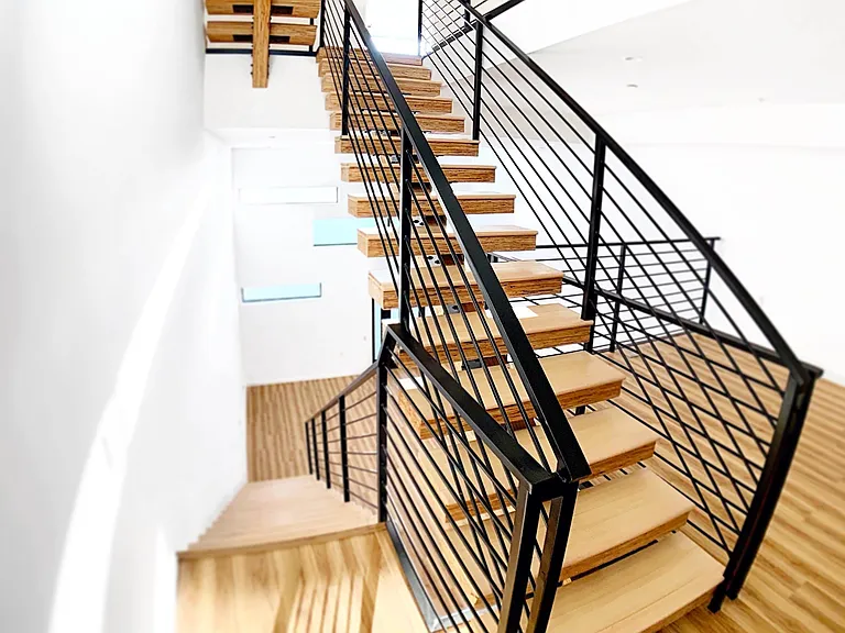 Mezzanine. Flex space overlooking living room. Very functional space perfect for a home office. Floor above is bedroom level.