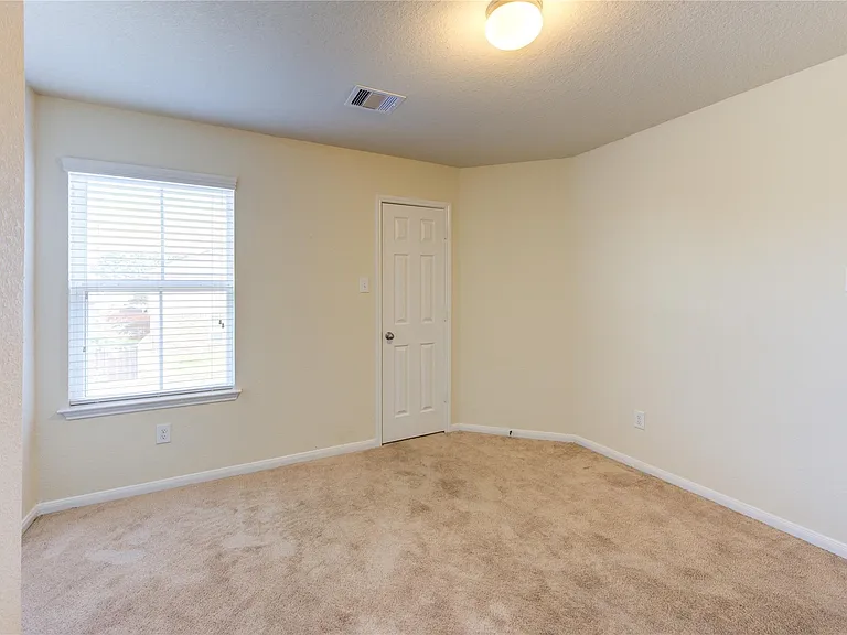 10907 Woodland Leaf Ln — Photo 20