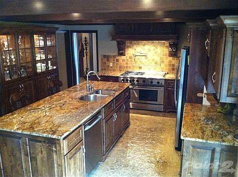 2228 Cedarbrook Custom Cabinets, granite counter tops, serious stove, pot filler