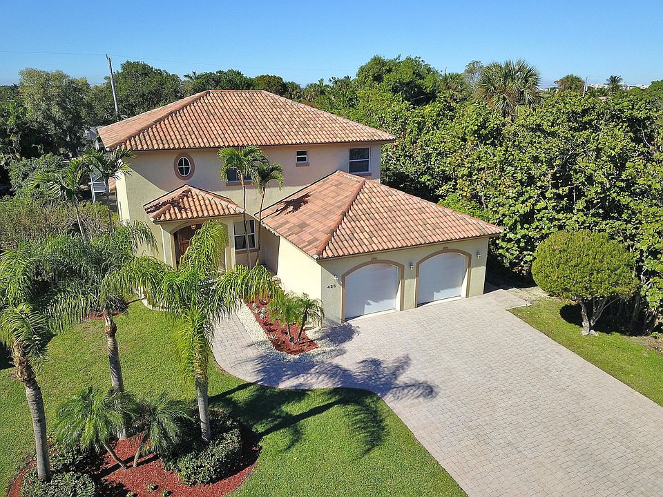 Deep Setback With Huge Driveway
