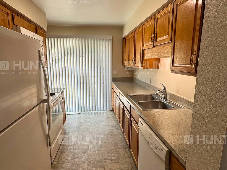 6654G E Primrose Dr — Photo 2