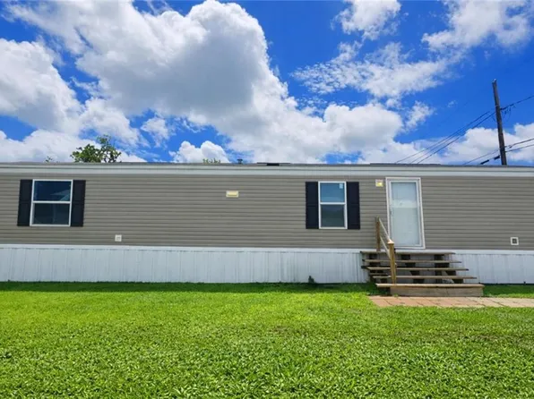 214 River Oaks Dr, Belle Chasse, LA 70037