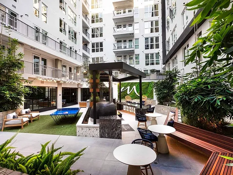 You'll enjoy lush green space, plentiful seating, an outdoor kitchen and more in the verdant courtyards at Modera San Diego
